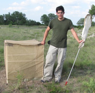 Paul Lenhart and one of his grasshopper gladiator cages on the Gainer tract.